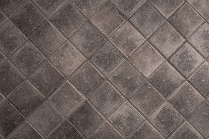 Worn-out grey tiles are one of the signs you need professional tile cleaning